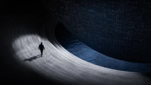 AI creativity represented by a lone figure moving beneath a vast computational structure in a dark architectural space